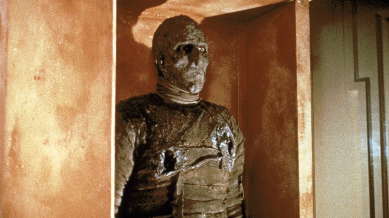 Christopher Lee emerging as Kharis in The Mummy (1959)