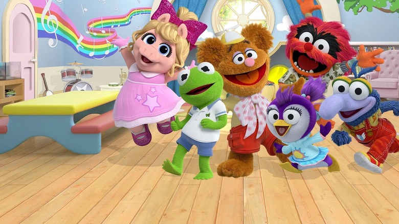 Computer-animated versions of infant Piggy, Kermit, Fozzie, Gonzo, and Animal