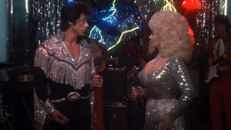 Nick and Jake, in sparkly country/western outfits, in the movie Rhinestone.