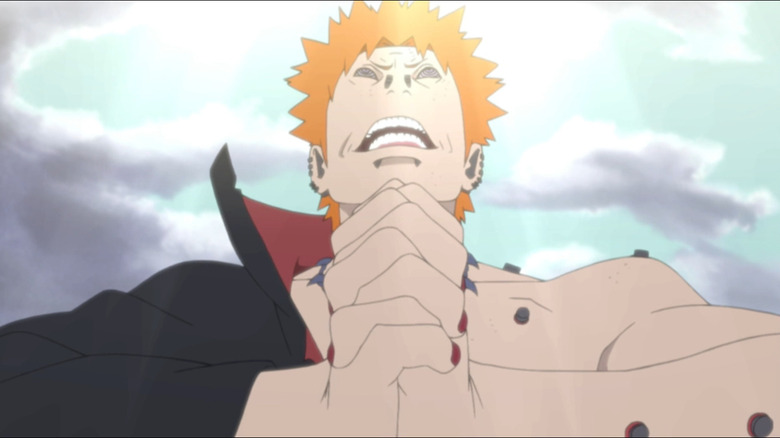 Naruto Shippuden pain clenches hands together for ninja signs