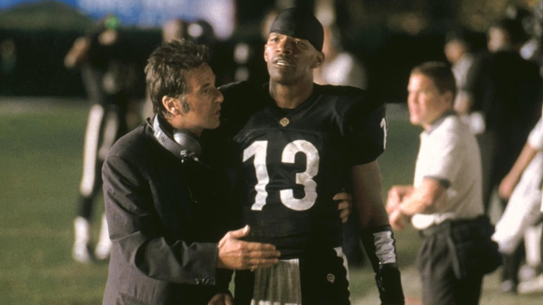 Al Pacino and Jamie Foxx hugging in Any Given Sunday