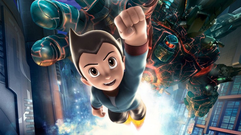 2009 poster of Astro Boy being chased by giant robot