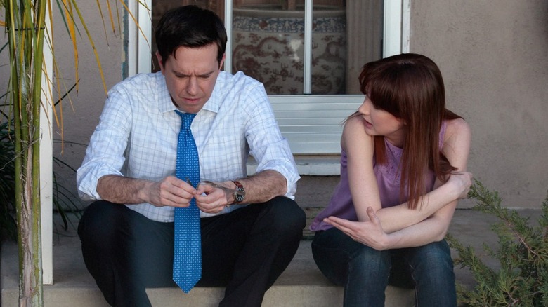 Andy and Erin sitting on steps on The Office