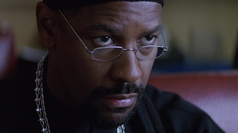 Denzel Washington's Alonzo Harris looks over his glasses in Training Day