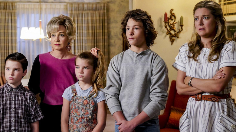 Sheldon, Mee-Maw, Missy, Georgie, and Mary standing together in Young Sheldon