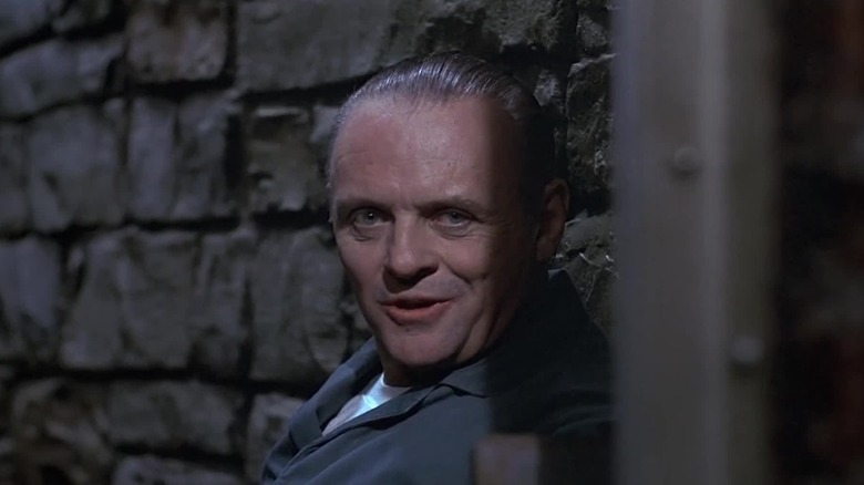 Hannibal Lecter learning against a brick wall in Silence of the Lambs