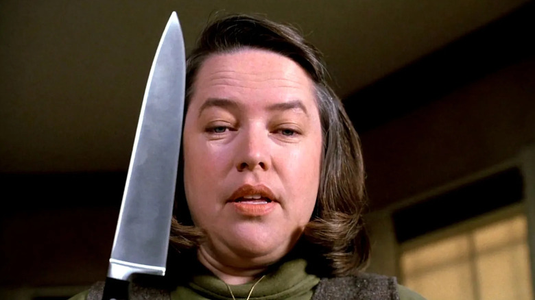 Annie brandishing a knife in Misery