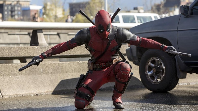 Bloodstains barely show on Deadpool's red suit