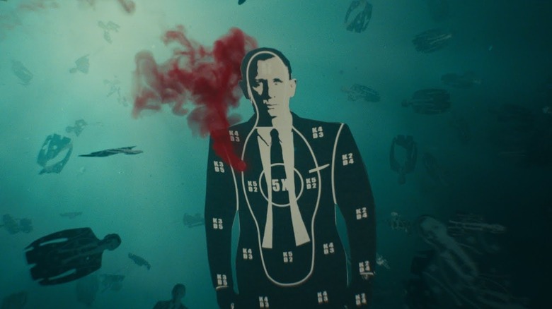 Skyfall opening sequence underwater shooting standee of James Bond bleeding