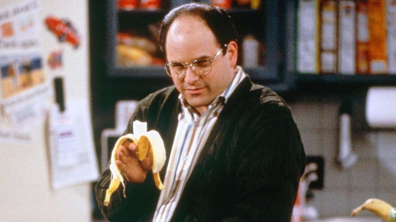 George eats a banana on the Seinfeld