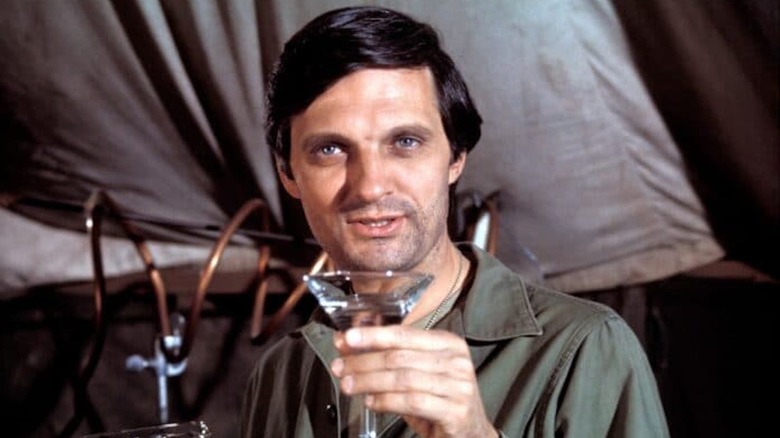 Alan Alda drinking martini on M*A*S*H