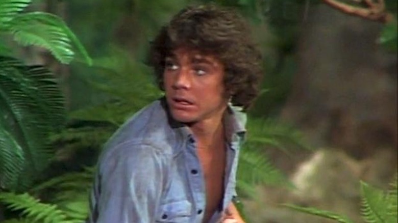 Wesley Eure flees trouble as Will Marshall in Land of the Lost