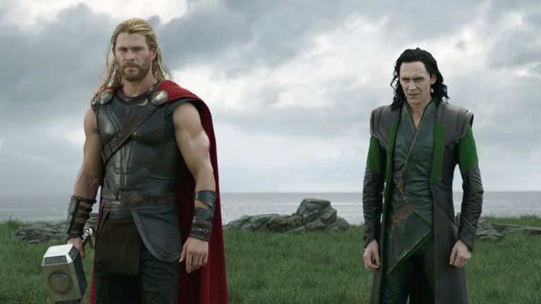 Thor and Loki stand on cliff in Norway