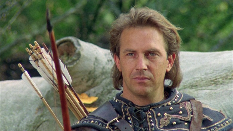 Kevin Costner as Robin Hood with his bow and arrow in Robin Hood: Prince of Thieves