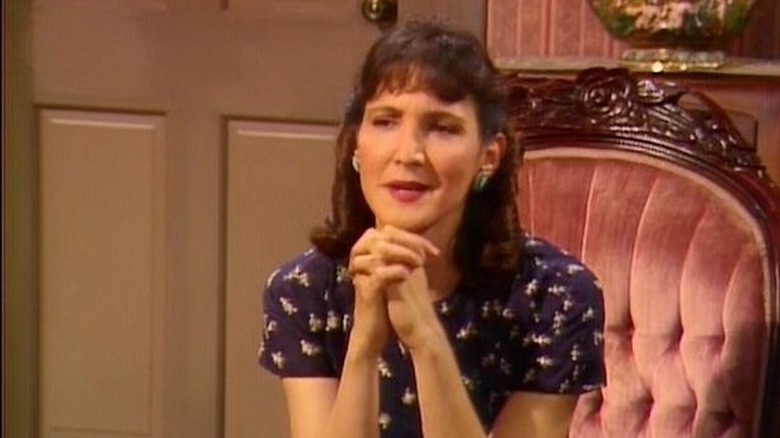 Lynnie Greene clasps her hands as Young Dorothy Zbornak in The Golden Girls