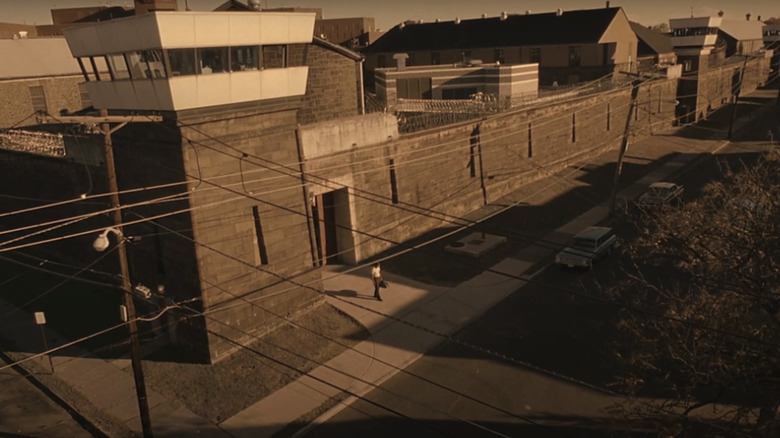 Denzel Washington's Rubin 'The Hurricane' Carter steps out of a prison (which is shown in a wide shot) in The Hurricane