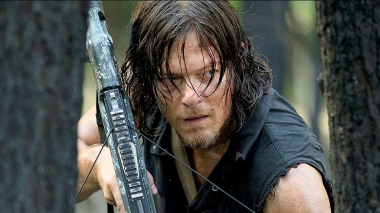 Daryl hunting with crossbow