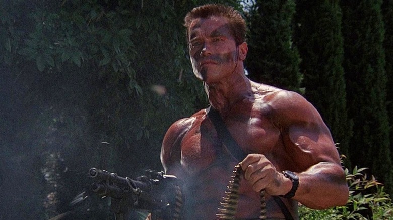 Arnold Schwarzenegger firing machine gun in Commando