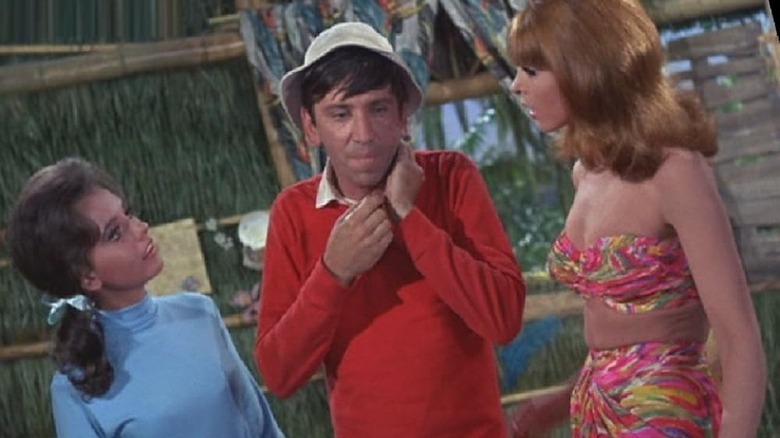 Bob Denver is caught between Tina Louise and Dawn Wells in Gilligan's Island