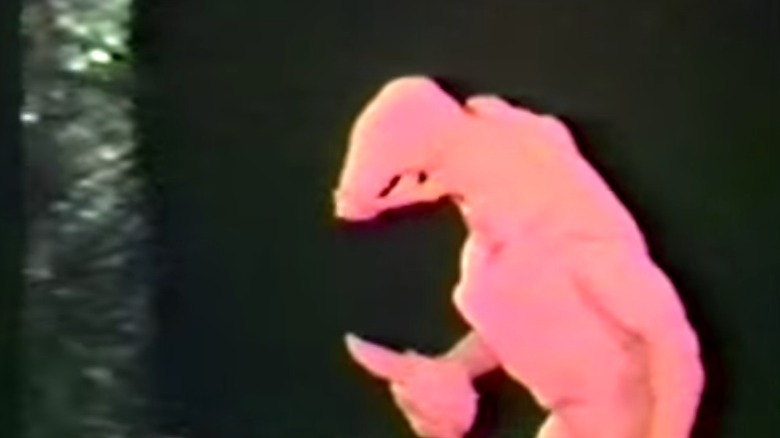 footage of red Predator suit