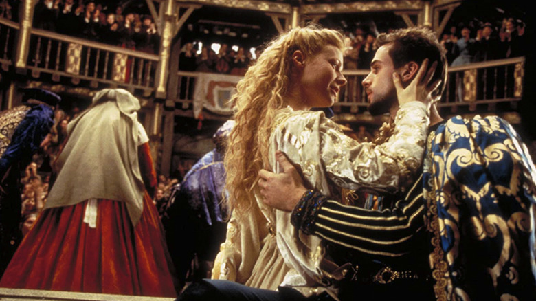 Gwyneth Paltrow as Viola de Lesseps glows in the arms of Joseph Fiennes as William Shakespeare in Shakespeare in Love