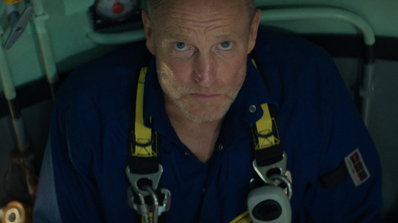 Woody Harrelson as Duncan Allock looking up in Last Breath