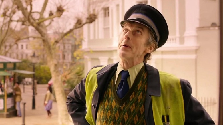 Mr. Curry (Peter Capaldi) monitoring every action in Windsor Gardens