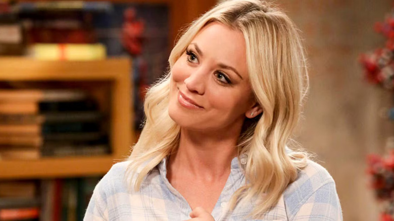 Penny smirking with her head tilted on The Big Bang Theory