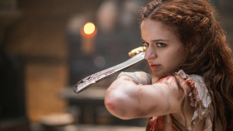 Joey King wielding a sword in The Princess