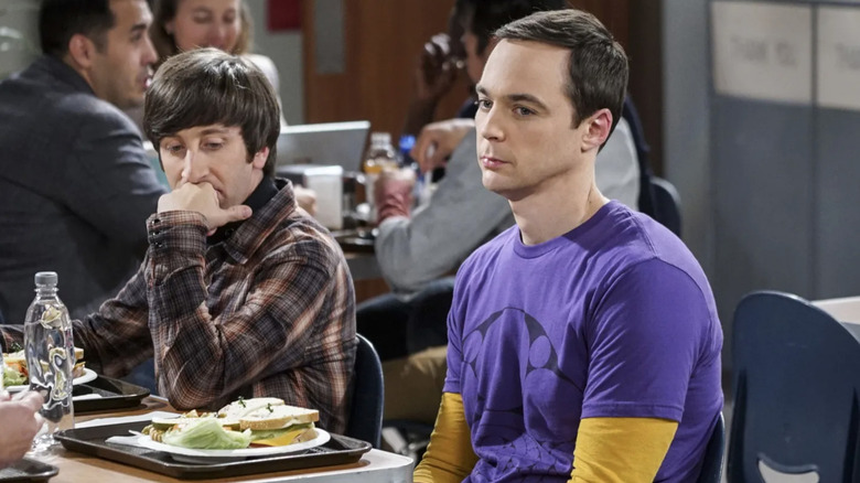 Jim Parsons' Sheldon Cooper looking uneasy in the cafeteria in The Big Bang Theory