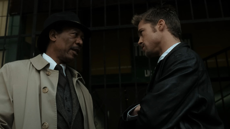 Morgan Freeman's William Somerset and Brad Pitt's David Mills stand face to face in Se7en