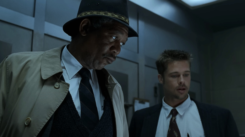 Morgan Freeman's William Somerset and Brad Pitt's David Mills stand side by side in Se7en