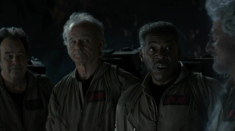 Ray, Peter and Winston looking at Egon's ghost