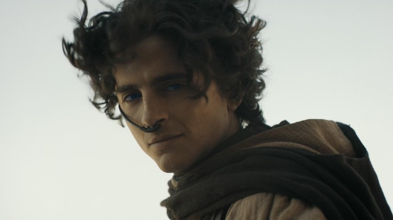 Timothee Chalamet's Paul Atreides looking over his shoulder in Dune: Part Two