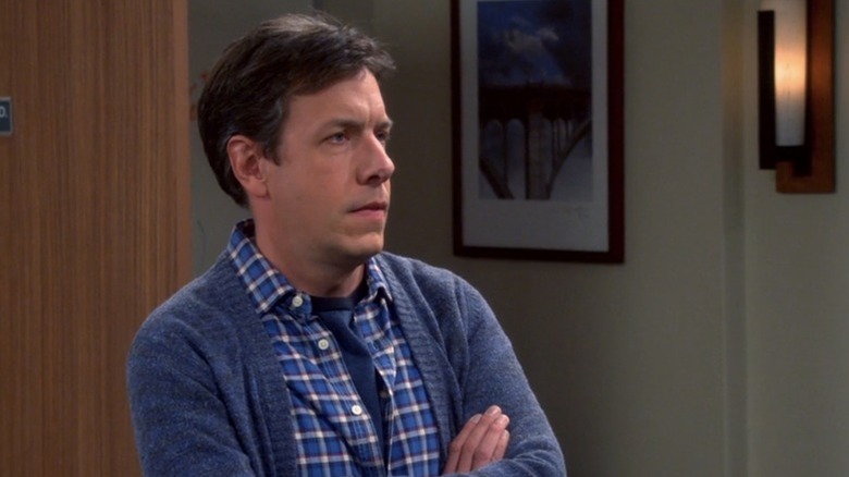 Barry Kripke standing with his arms crossed on The Big Bang Theory