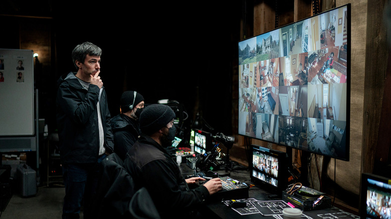 nathan fielder watching a bunch of hidden camera feeds in the show the rehearsal