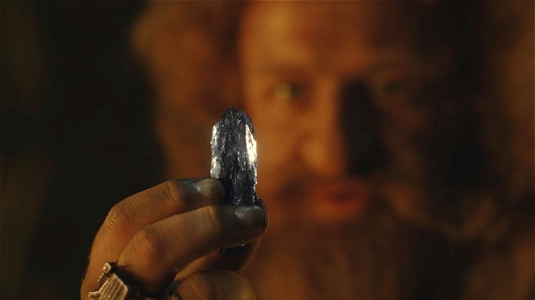 Durin holding a Mithril shard in The Rings of Power