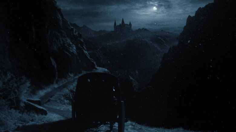 A carriage travels to Count Orlok's castle in Nosferatu