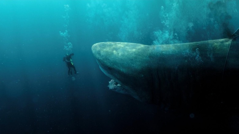 The Megalodon tries to eat a pair of scuba divers in The Meg