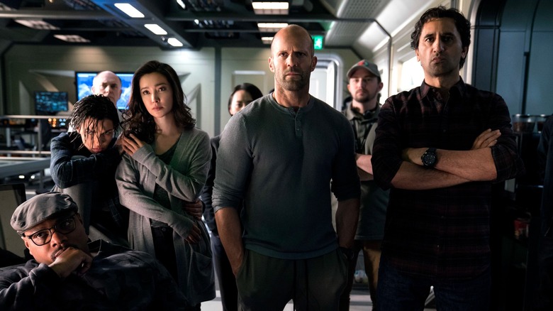 Jason Statham as Jonas Taylor and his team in their lab in The Meg