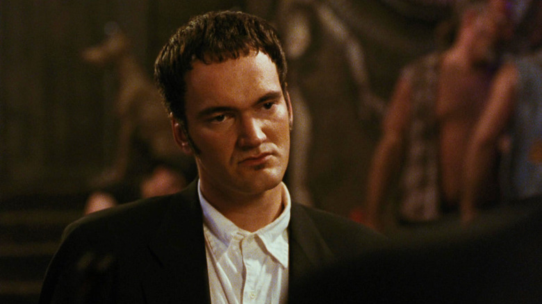 Quentin Tarantino as Richie looking bored in From Dusk Till Dawn