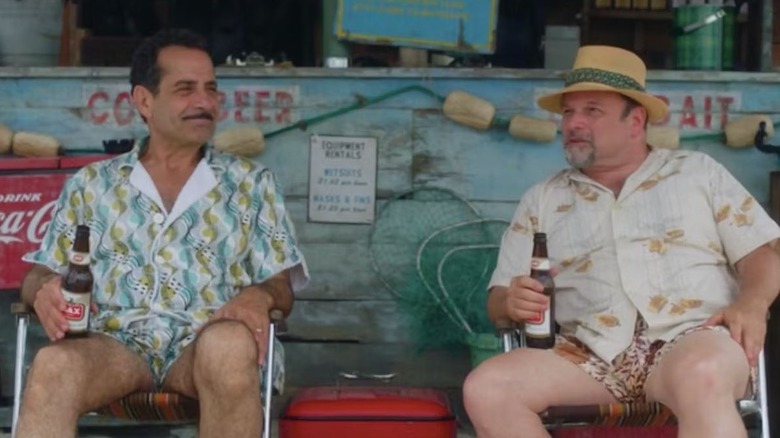 Tony Shalhoub as Abe and Jason Alexander as Asher are sitting on beach chairs on The Marvelous Mrs. Maisel