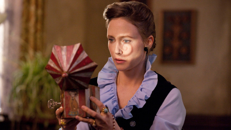 Vera Farmiga with a toy in The Conjuring