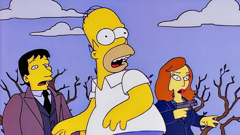 Mulder, Homer, and Scully looking shocked on The Simpsons