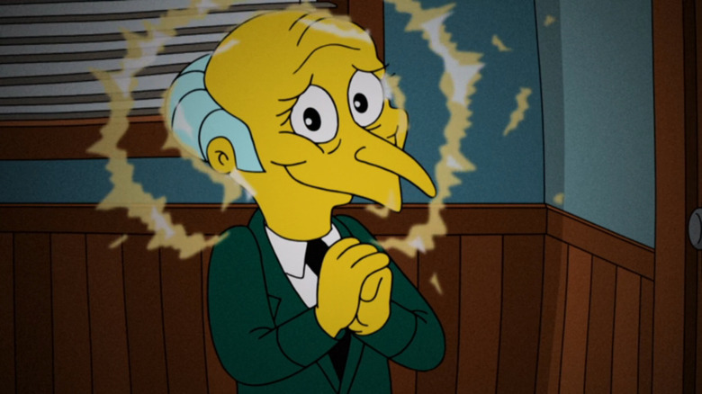 Mr. Burns smiles like The Grinch in The Simpsons