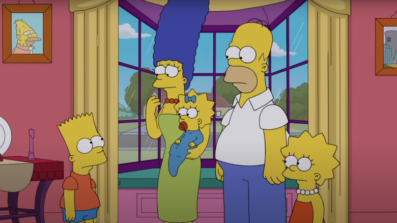 The Simpsons family stands together in the living room by the window in The Simpsons