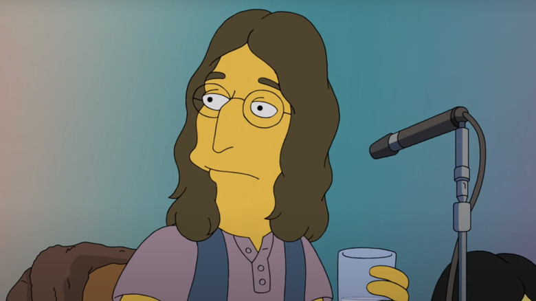 John Lennon holds a glass of water while sitting in front of a microphone in The Simpsons