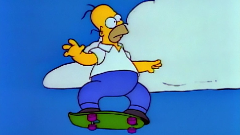 Homer Simpson on a skateboard, sailing through the air in The Simpsons