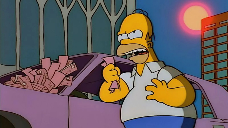 Homer Simpson angrily holding a parking ticket next to is very, very ticketed car. The World Trade Canter building is in the background. This is on The Simpsons.