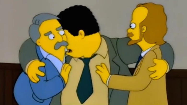 Cliff and Frasier comforting Norm in the Simpsons episode Fear of Flying